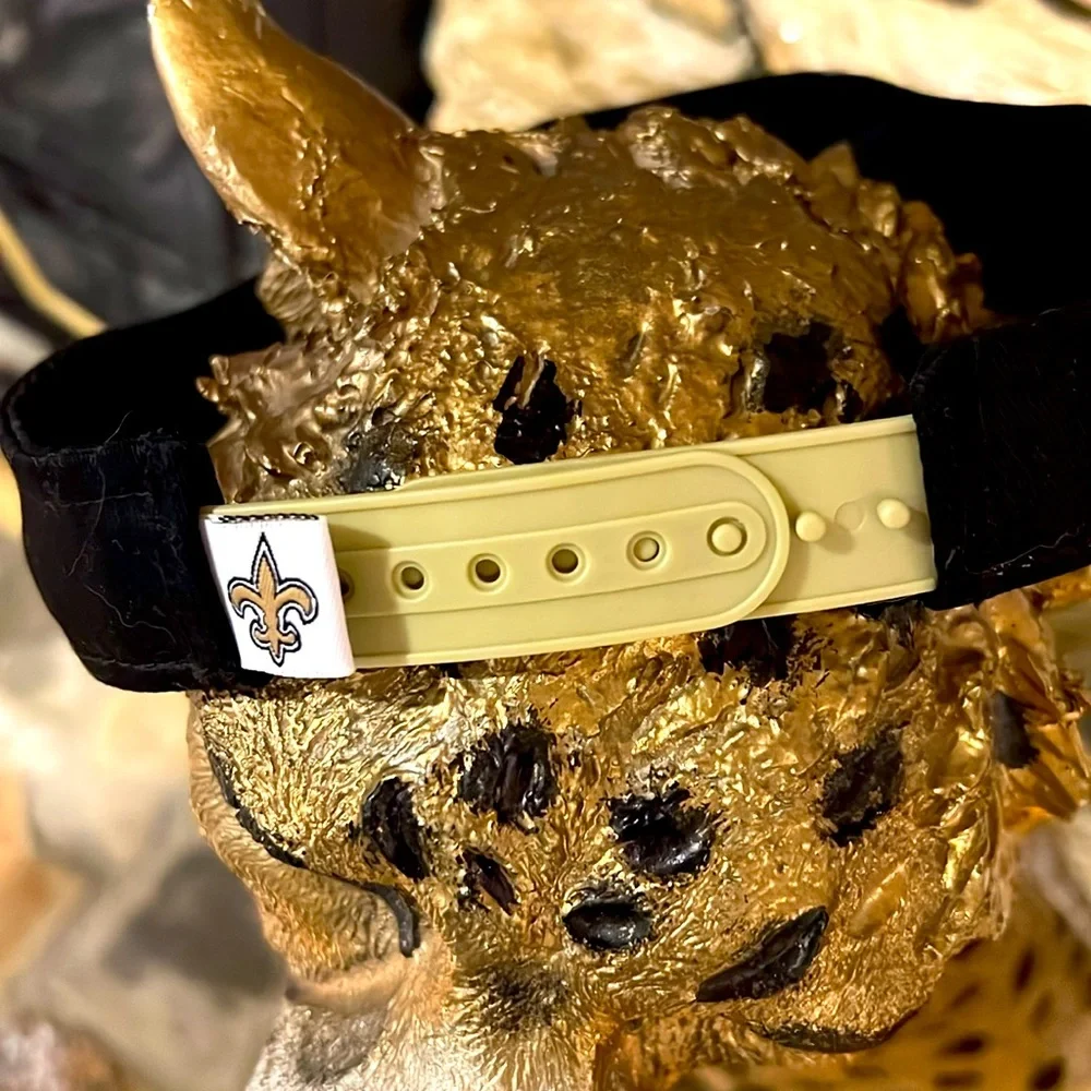 NFL Store. Saints Fleur De Lis Black and Gold. NWOT Visor. Adjustable.